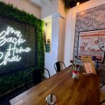 My Back Home Chai Interior Table and Neon Sign